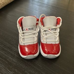 Red and white Air Jordan 11s “Cherry”